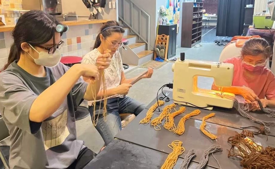 Theater staff personally modify and revise costumes